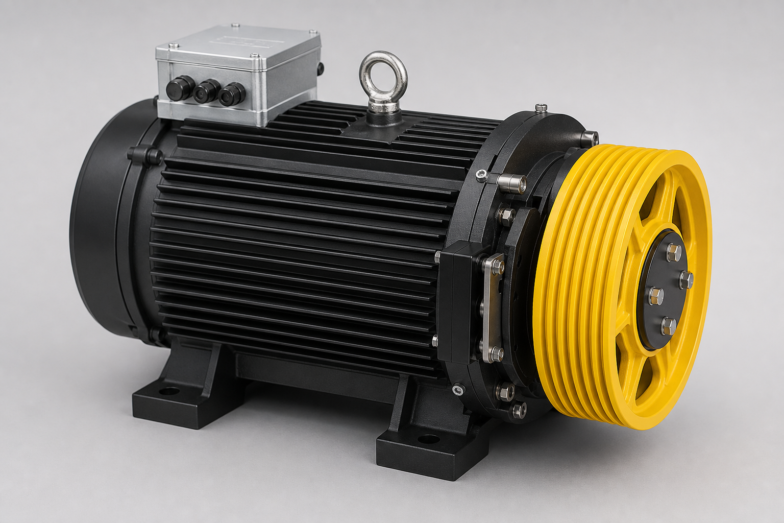 Gearless elevator traction machine — black motor with yellow sheave